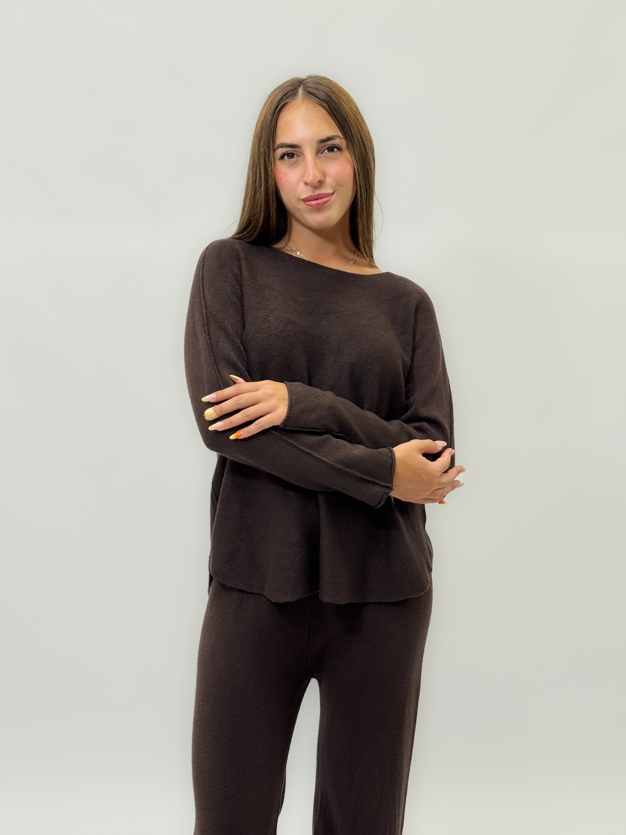 Completo morbido in maglia tinta unita