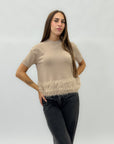 Maglia con piume sul fondo