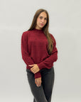 Maglione con perle applicate