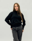 Maglione con perle applicate