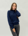 Maglione con perle applicate