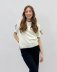 Maglia con fiocchi