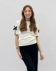 Maglia con fiocchi