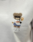 T-shirt in cotone con orsetto peluche