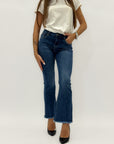 Jeans donna bootcut blu con fondo sfrangiato