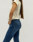 Jeans donna bootcut blu con fondo sfrangiato