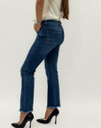 Jeans donna bootcut blu con fondo sfrangiato