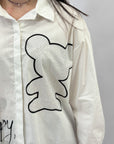 Camicia con strass e scritta