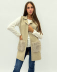 Gilet lungo con tasche in ecopelliccia
