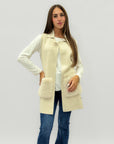Gilet lungo con tasche in ecopelliccia