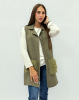 Gilet lungo con tasche in ecopelliccia