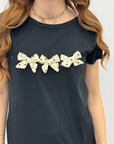 T-shirt con fiocchi