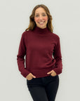Maglione collo alto con costine sul fondo