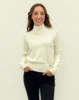 Maglione collo alto con costine sul fondo