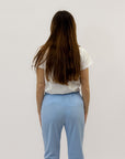 Pantaloni a sigaretta con svolta
