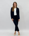 Pantaloni a sigaretta con svolta