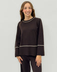 Completo in maglia con profili a contrasto