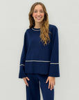 Completo in maglia con profili a contrasto
