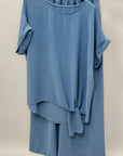 Completo morbido con pantaloni palazzo e top relaxed