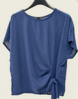 Blusa a righe con nodo laterale