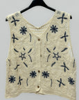 Gilet ricamato con lavorazione crochet e bottoni frontali