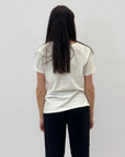 T-shirt in cotone con scritta "fuoriluogo ovunque"