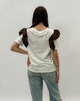T-shirt con maniche volant