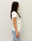 T-shirt petite con scritta "Nel fiore dei miei drammi"