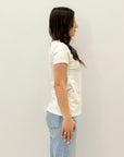 T-shirt petite con scritta "Mi scoccio"