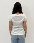 T-shirt petite con scritta "Non smetterò mai di spendere"