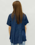 Blusa in denim leggero con pieghe laterali e bottoni