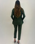 Pantaloni a sigaretta con svolta