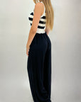 Pantaloni con elastico bianco