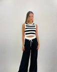 Pantaloni con elastico bianco