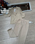 Pantaloni a sigaretta con svolta