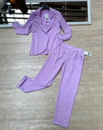 Pantaloni a sigaretta con svolta