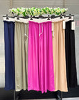 Pantaloni con elastico bianco
