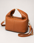 Borsa mini con manico annodato in vera pelle – Camel, vista a tre quarti