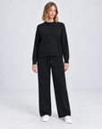 Completo in maglia B12 2311 Nero indossato da Polly 5 - vista frontale