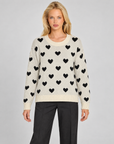 Maglia donna con cuori beige indossata da Polly 7 — vista frontale