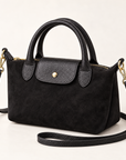 Mini borsa effetto scamosciato nero – vista tre quarti con tracolla