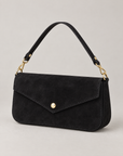Pochette A2 in vera pelle scamosciata nera – vista a tre quarti su sfondo neutro