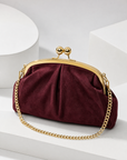 Pochette in vera pelle scamosciata bordeaux vista tre quarti