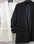 Blazer elegante a manica arrotolata