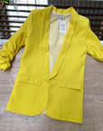 Blazer elegante a manica arrotolata