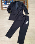 Pantaloni eleganti con fiocco