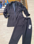 Pantaloni eleganti con fiocco