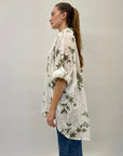 Camicia in pizzo con dettaglio fiori