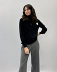 Pullover dolcevita ampio con gioielli