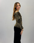 Maglietta con paillettes e scollo a bardot
